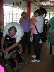 Child with Ceribral Palsey recieving wheelchair